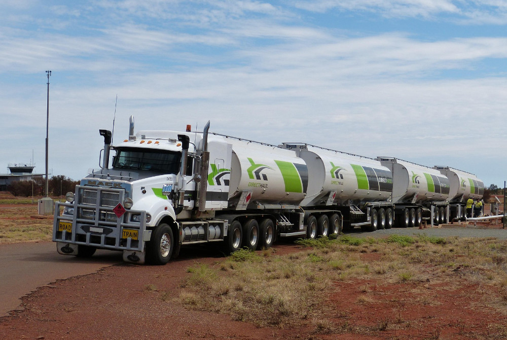 Tanker truck tansporting multiple tanks.